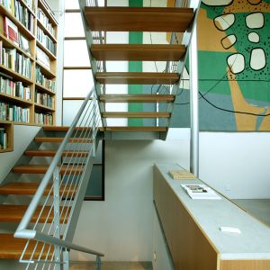 A well-constructed stairway featuring a sturdy railing